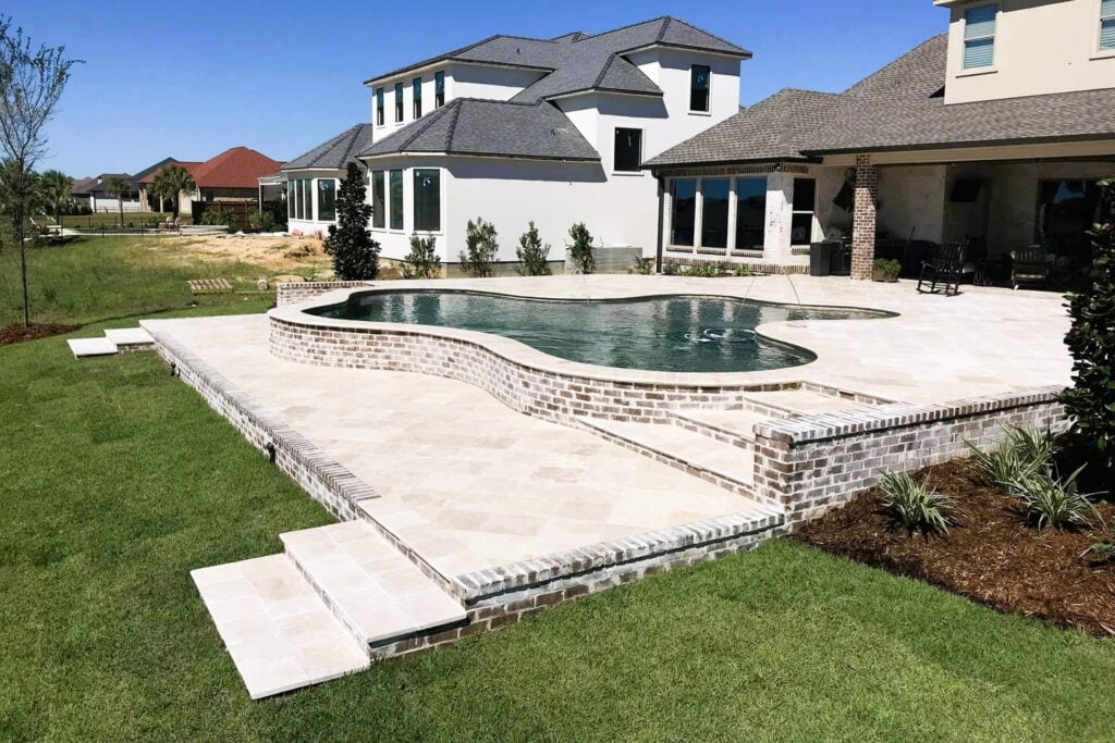 10 Reasons You Need a Custom Swimming Pool custom backyard swimming pool